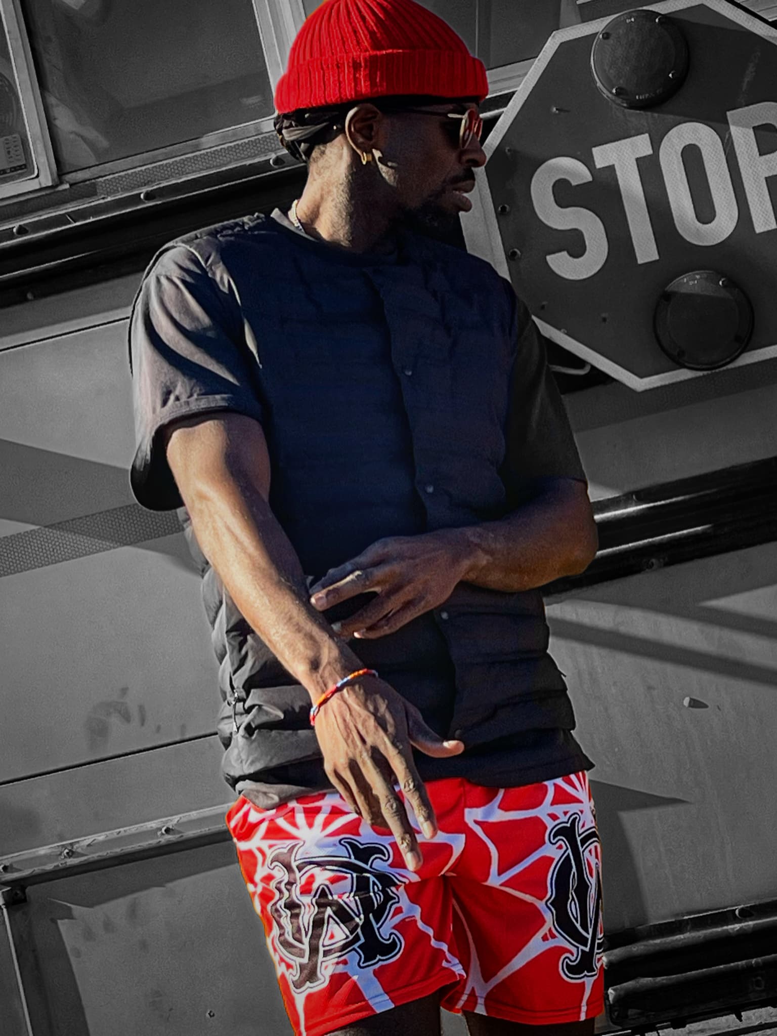 Close-up of the OG Mesh Shorts in Red – Spider Web Edition, featuring bold Wolves Cry monogram and striking web pattern. Streetwear meets performance.