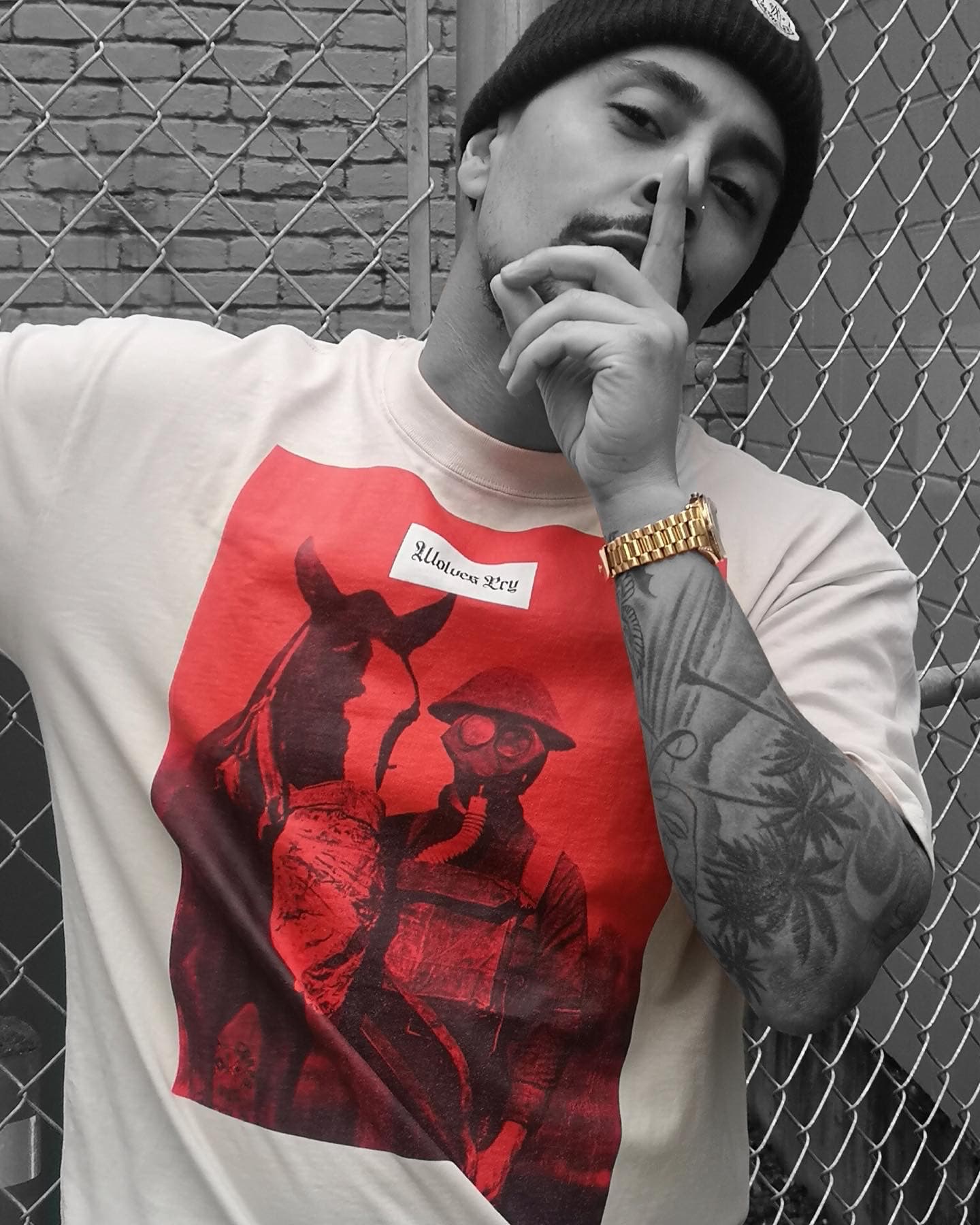 Model wearing the Wolves Cry Equestrian Red Remix Tee, highlighting the oversized fit and bold red artwork. Designed for statement-making streetwear style.